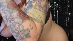 Redhead swallows a toy cock and vibrates her clit